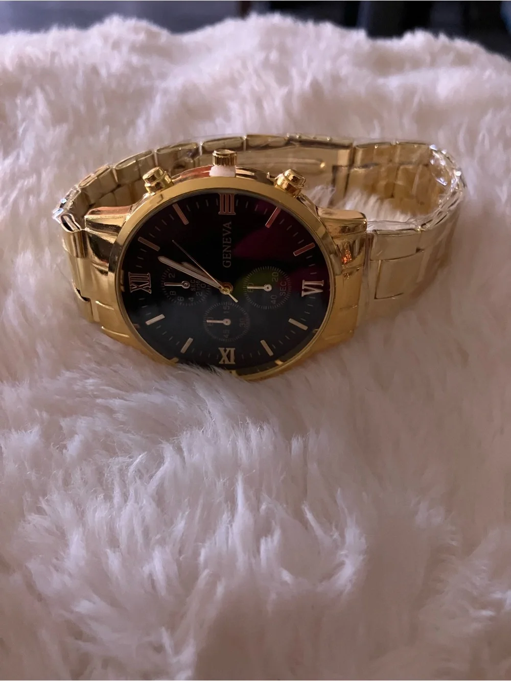 Geneva Gold Tone Watch with Black Dial